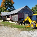 Grey Roots Museum in Owen Sound, barn 20x82 ft was rolled out of the way for new foundation.